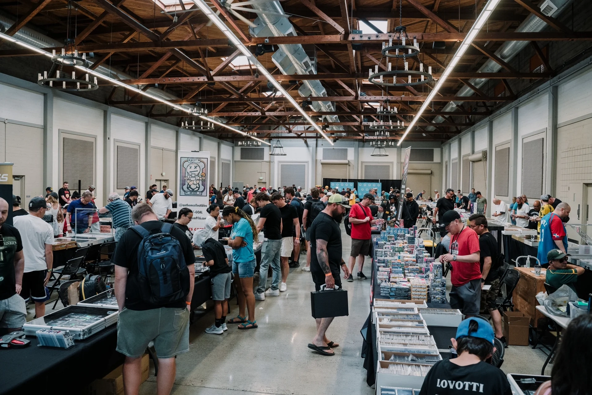 Trading card show with collectors